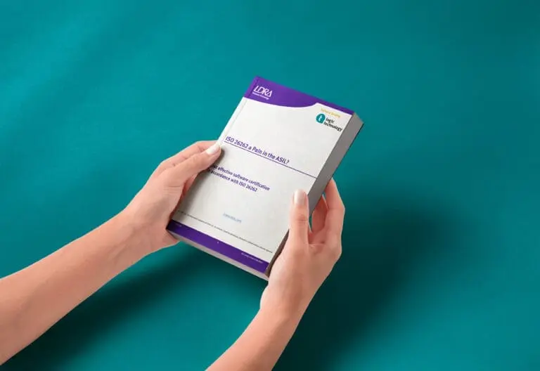 Cover mock-up of LDRA ISO 26262 technical briefing PDF titled 'A Pain in the ASIL?', focused on automotive software certification and functional safety