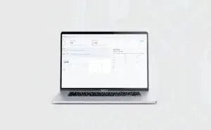 A MacBook Pro displaying a cybersecurity compliance dashboard titled ‘Cyber Resilience Act.’ The screen shows a compliance score of 4%, 1 of 23 requirements passed, and a critical risk level with 2,228 total vulnerabilities. A section on the right lists the top 8 software licenses used, including EPL, ISC, and Apache 2.0.